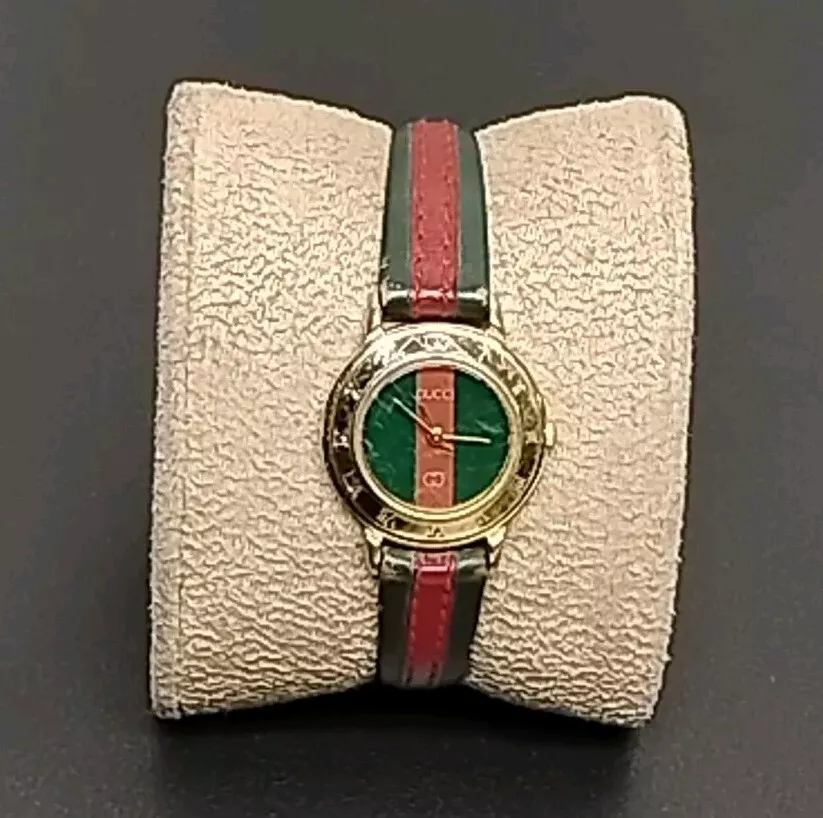 Montre femme vintage Gucci à quartz ligne sherry ronde 25 mm 