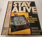 VINTAGE MILTON BRADLEY STAY ALIVE BOARD GAME 1971 missing 4 rubber pads see pics