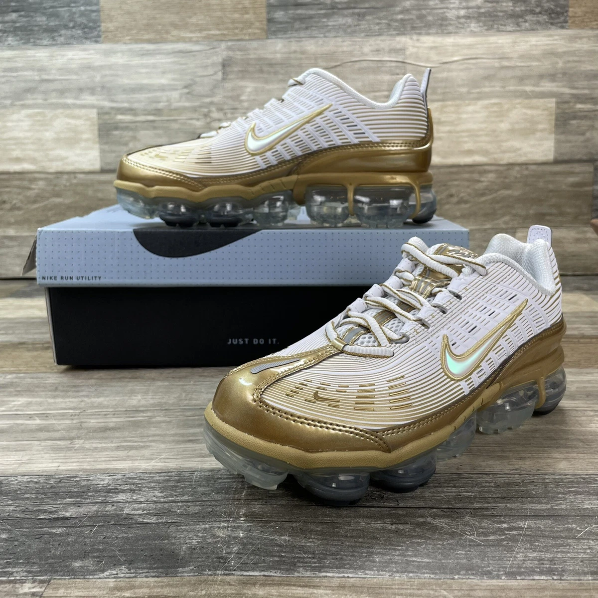 Women's white and gold vapormax sale
