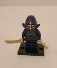 LEGO Kendo Fighter Collectible Minifigure Series 15 71011 with swords and stand.