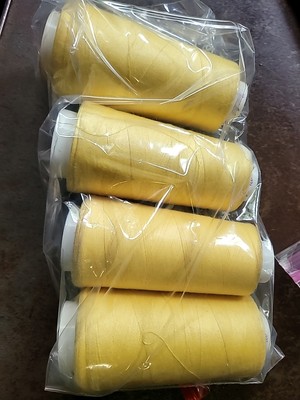 Maxi-Lock Brand  Overlock Thread Cones   Color: Sunlight. Lot Of 4.