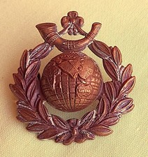 BRASS ROYAL MARINES LIGHT INFANTRY WW1 CAP BADGE - D223