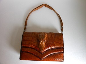 alligator head purse