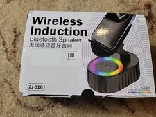 White Cell Phone Stand with Wireless Bluetooth Speaker Induction HD Surround