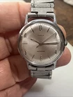 Vintage 1970's Timex Men's Watch 33mm Silver tone Works Stretch band Collectible