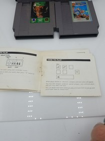 NES Games Bundle Of 4 Ikari Warriors 2 Tecmo Bowl Bionic Commando Winter Games