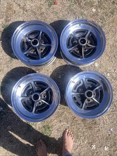 4 Genuine OEM Buick rally wheels 15x6 Stamped 853