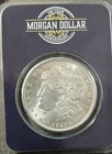 1921 UNC morgan silver dollar in a 100 year anniversary holder