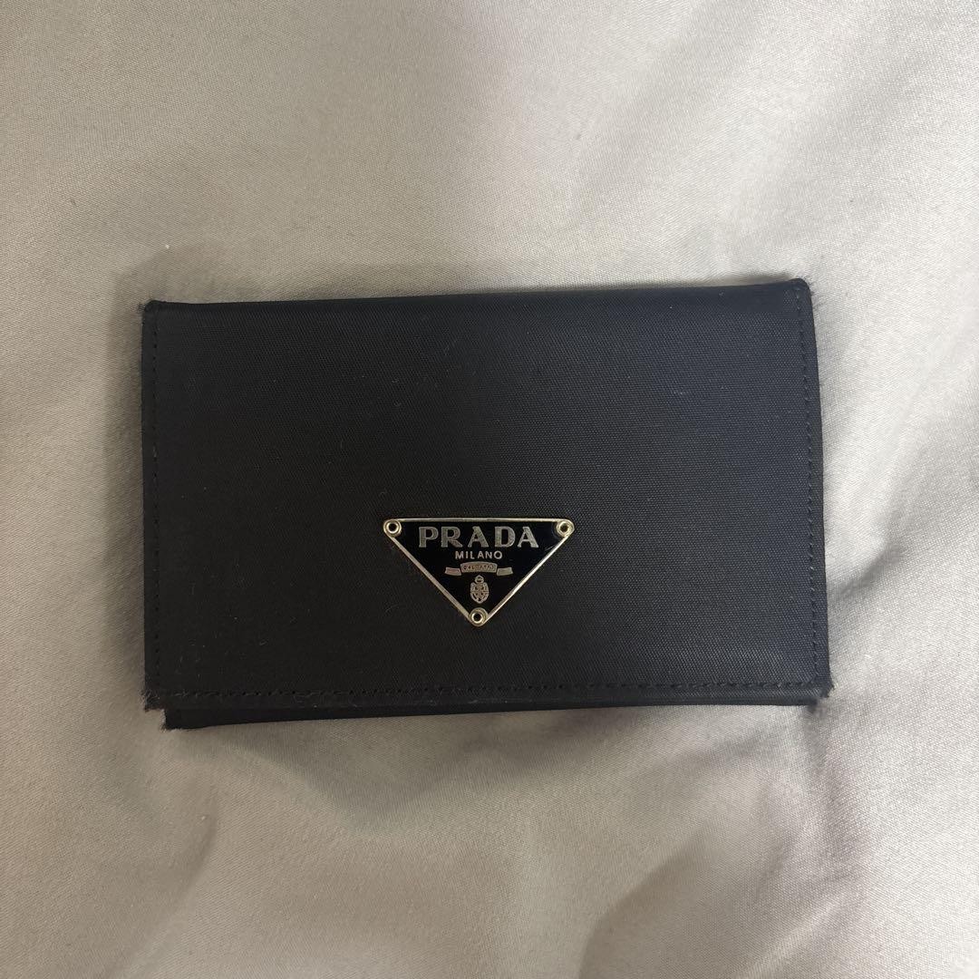 Prada black leather bifold wallet with card slots