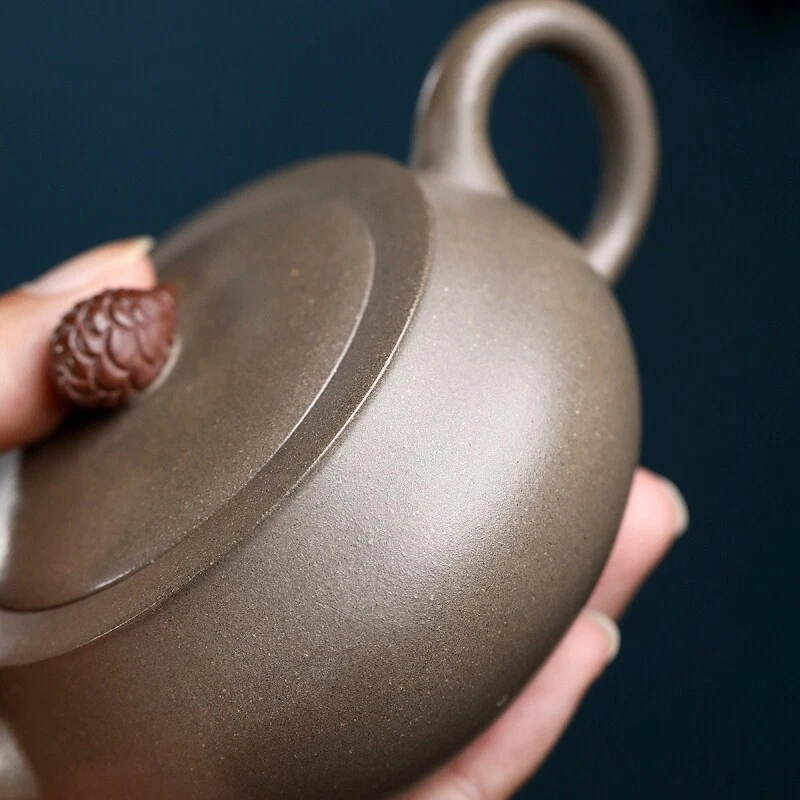Tetera hecha a mano en venta marcada real Yixing Zisha bola de arcilla en forma de agujero infusor Foto 4 de 4