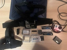 GoPro Hero 3+ Camera,  Batteries & Extra Accessories . (Works ButDamaged Screen)