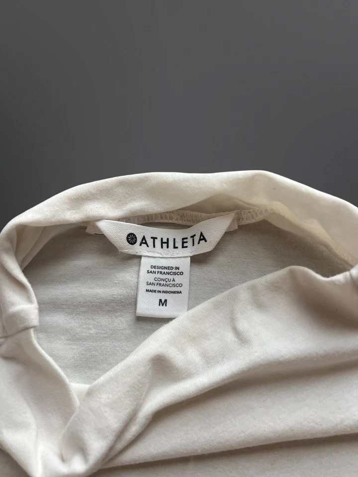Camiseta sin mangas Athleta Studio sin mangas cuello alto para mujer M crema usada en excelente estado Foto 2 de 4