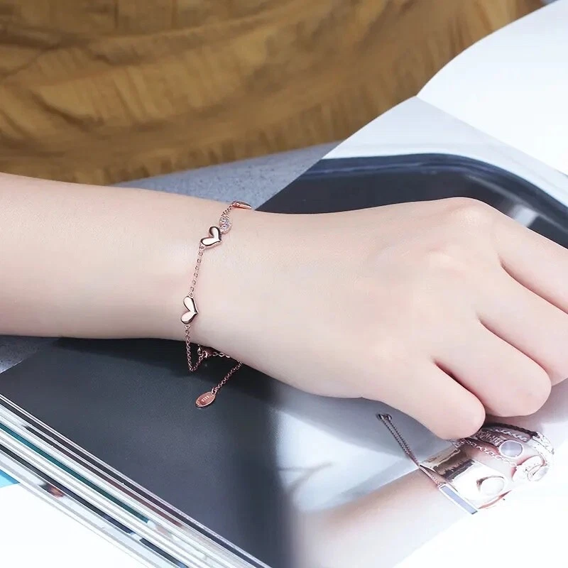 Pulsera de cuatro corazones de oro rosa 925 con acento de circonita - ajustable Foto 2 de 4