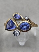9K Gold AA Tanzanite Ring with Zircon 2.76g Size L�
