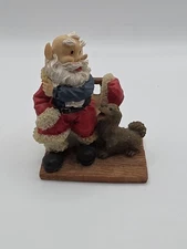 Elf Santa Taking Off Jacket Brown Dog