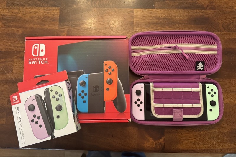 Nintendo Switch with Neon Blue and Neon Red Joy-Con With Extra Joy Cons