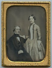 A half plate daguerreotype of handsome and elegant young couple.