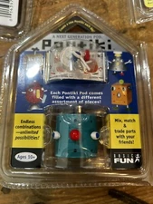 Pontiki Blue Round Figure Next Generation pod Rare Game Toy In Box #1012