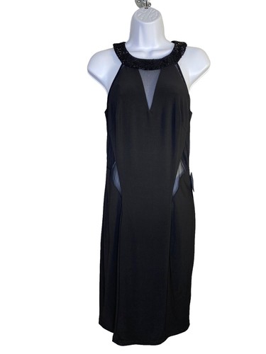 green emerald velvet dress Xscape Evenings 