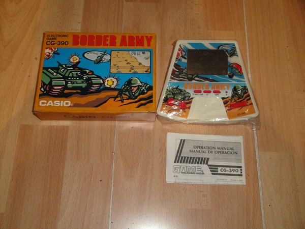 BORDER ARMY GAME & WATCH BY CASIO ELECTRONIC GAME CG-390 NEW BUT HAVE SCRATCHES