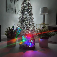 CHRISTMAS MUSICAL HOUSE HAND PAINTED IN YELLOW OR BLUE .MORE THAN 4 SONGS. LIGHT