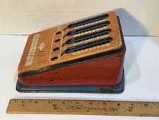 Vintage Wolverine Tin Litho Toy Adding Machine Pull Dial Calculator