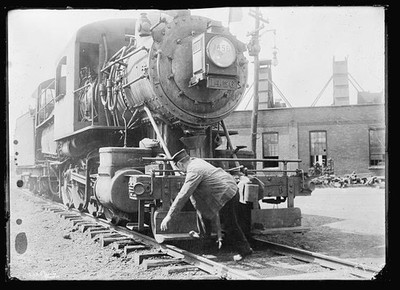 Photo:Railroad First Aid 1910s Steam Locomotive Worker Repairing Engine