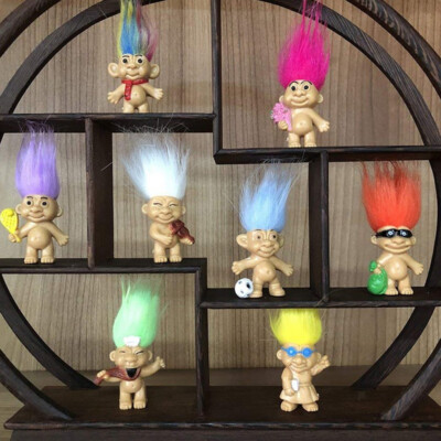 toy trolls with colored hair
