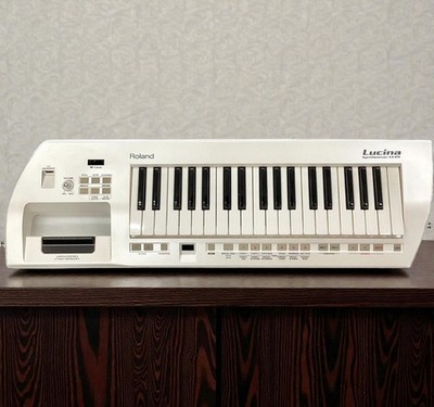 Roland AX-09 Lucina Pearl White KEYTAR Shoulder Synthesizer