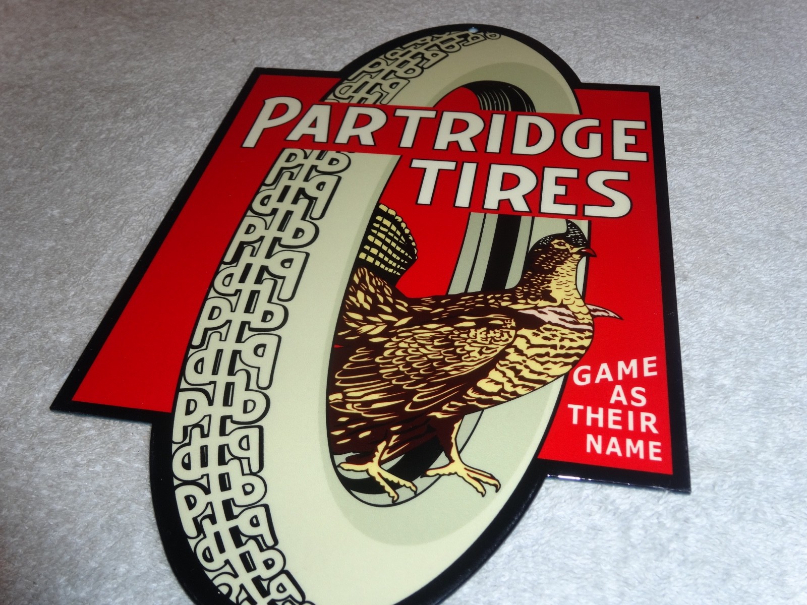 VINTAGE "PARTRIDGE TIRES" W/ HEN / ROOSTER 12" METAL TIRE GAME GASOLINE OIL SIGN