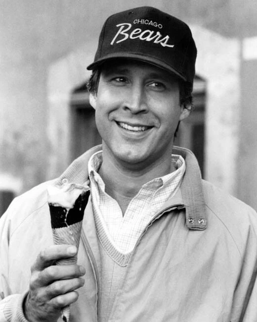 Chevy Chase classic smiling as Clark Griswold in Chicago Bears hat