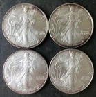 2004, 2005, 2006, and 2010 $1 American Silver Eagle Dollars