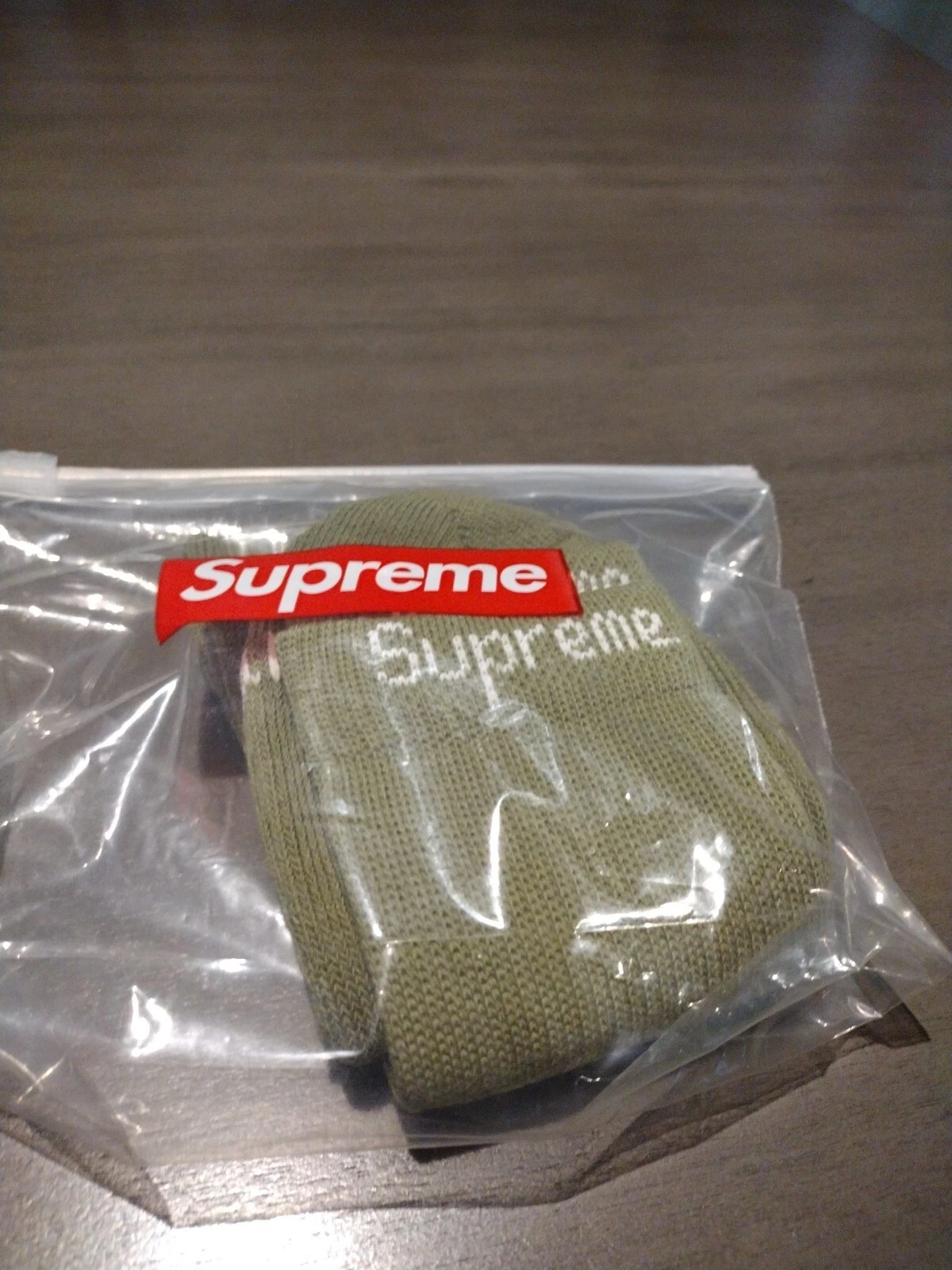 Chaussettes vertes Supreme plus sac zippé Supreme 1 paire de chaussettes