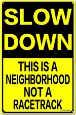 Slow Down THIS IS A Neighborhood Not A Racetrack Tin Metal Signs