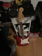 Squier Strat Electric Guitar hardtail Metal Flake Red & Squier Speakers.
