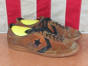 who designed the converse all star trainer