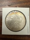 1884-CC Morgan Silver Dollar Original Lustre, Mint Condition, Raw