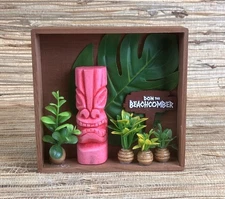 Tiki Art Pink Resin Tiki with Don the Beachcomber Sign and lots of Plants