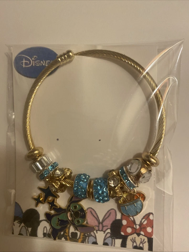 Pulsera con dije de puntada de cable azul turquesa tono dorado Foto 4 de 4