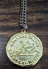 Vintage Caesars Palace Las Vegas, Nevada gold-tone souvenir medallion