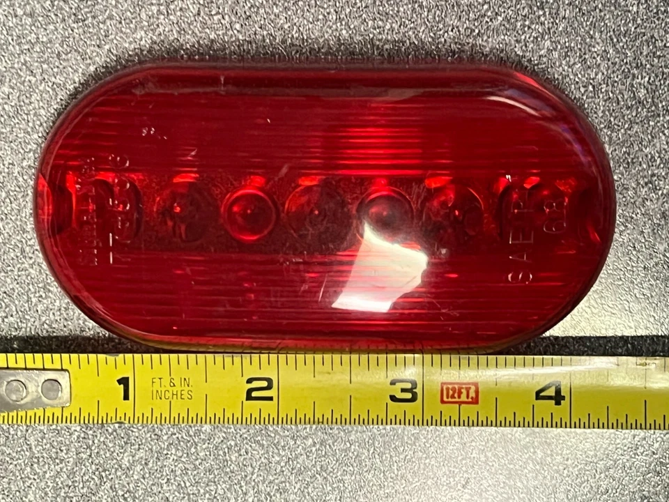 77-556 LENTE SEÑAL-STAT ROJO, OVALADA, 2" X 4", NUEVA Foto 2 de 2