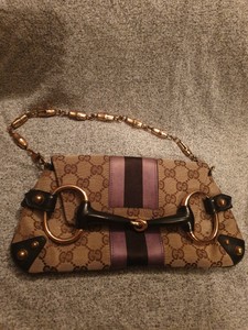 gucci clutch monogram