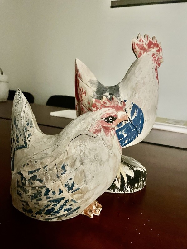 Hand-painted distressed wooden rooster and hen folk art figures.  Hand Carved