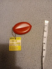 Red antique QUIKOIN VINTAGE COIN HOLDER WITH KEYCHAIN Copyright 1967