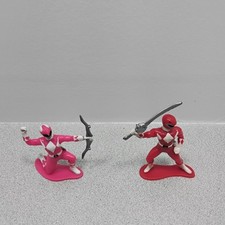 One Mighty Morphin Pink Also One Mighty Morphin Red Action Figures.