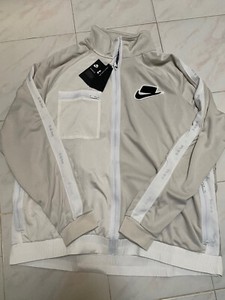 nike light bone jacket