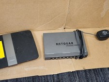 Netgear ProSafe FVS318 8-Port 10/100Mbps VPN Firewall and Cisco Linksys E4200