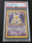 Vintage Pokemon Alakazam Holo 1/102 Base Set 1999 PSA 7 NM