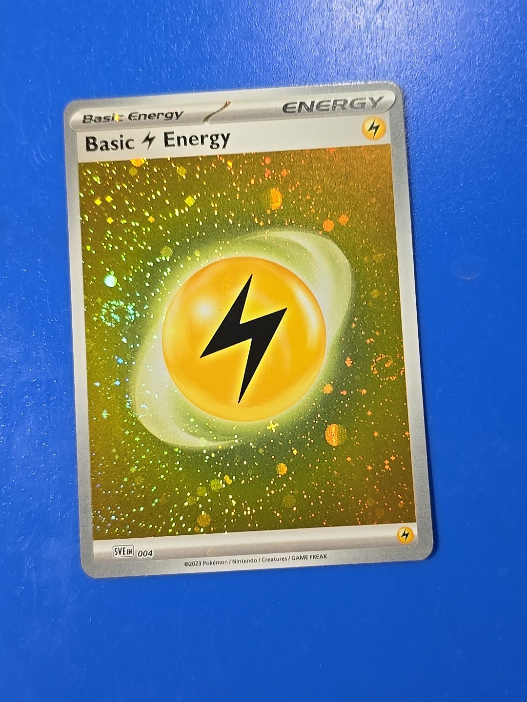 Basic Lightning Energy (Cosmos Holo) 004 Sv01: Scarlet & Violet Base Set Holo