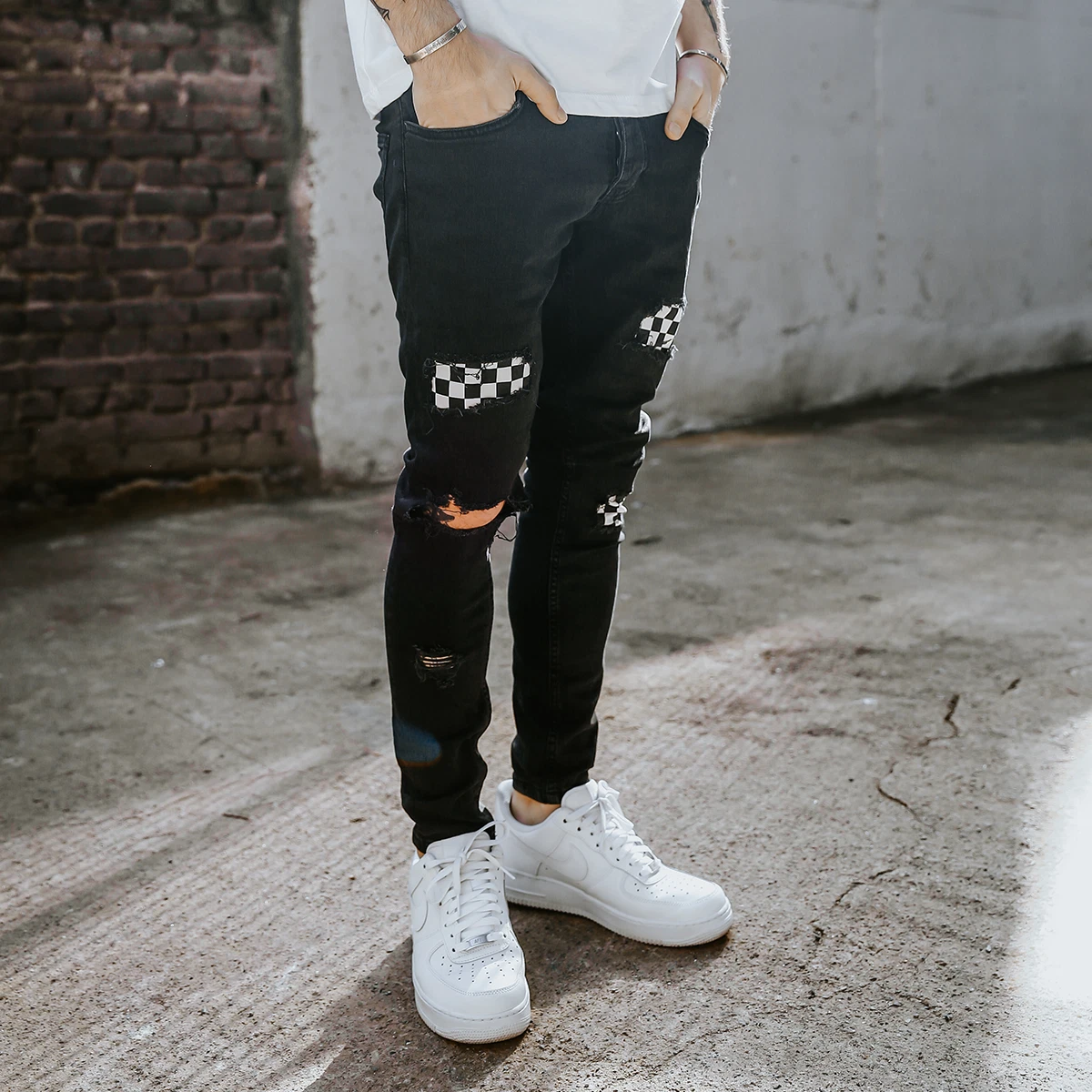 Knee ripped jeans best sale mens